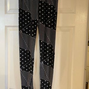 True Rock leggings B&W 4 patterns. 2 knit/polyester; 2 silky/polyester